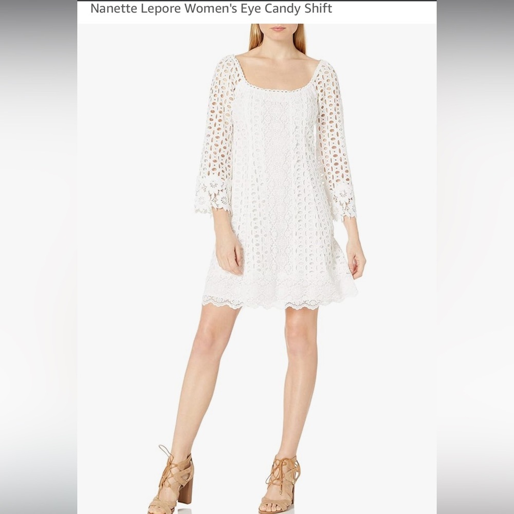 Nanette Lepore “Eye Candy” Eyelet and Lace Mini Dress 
Size: 2
EUC
